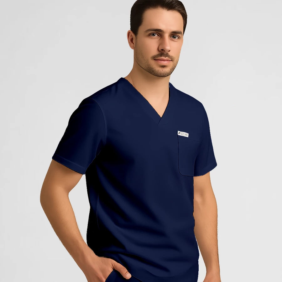 Photo de Pyjama de Bloc Homme - Col V Stretch – confort, broderie et style professionnel. FIGS.ma | Scrubs Maroc.