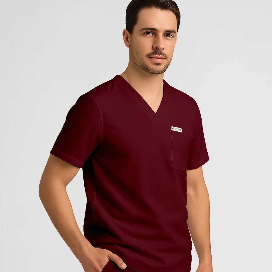 Photo de Pyjama de Bloc Homme - Col V Stretch – confort, broderie et style professionnel. FIGS.ma | Scrubs Maroc.