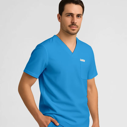 Photo de Pyjama de Bloc Homme - Col V Stretch – confort, broderie et style professionnel. FIGS.ma | Scrubs Maroc.