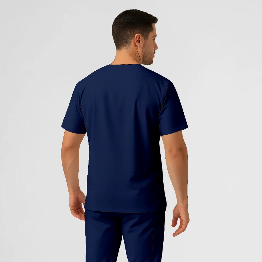 Photo de Pyjama de Bloc Homme - Col V Stretch – confort, broderie et style professionnel. FIGS.ma | Scrubs Maroc.