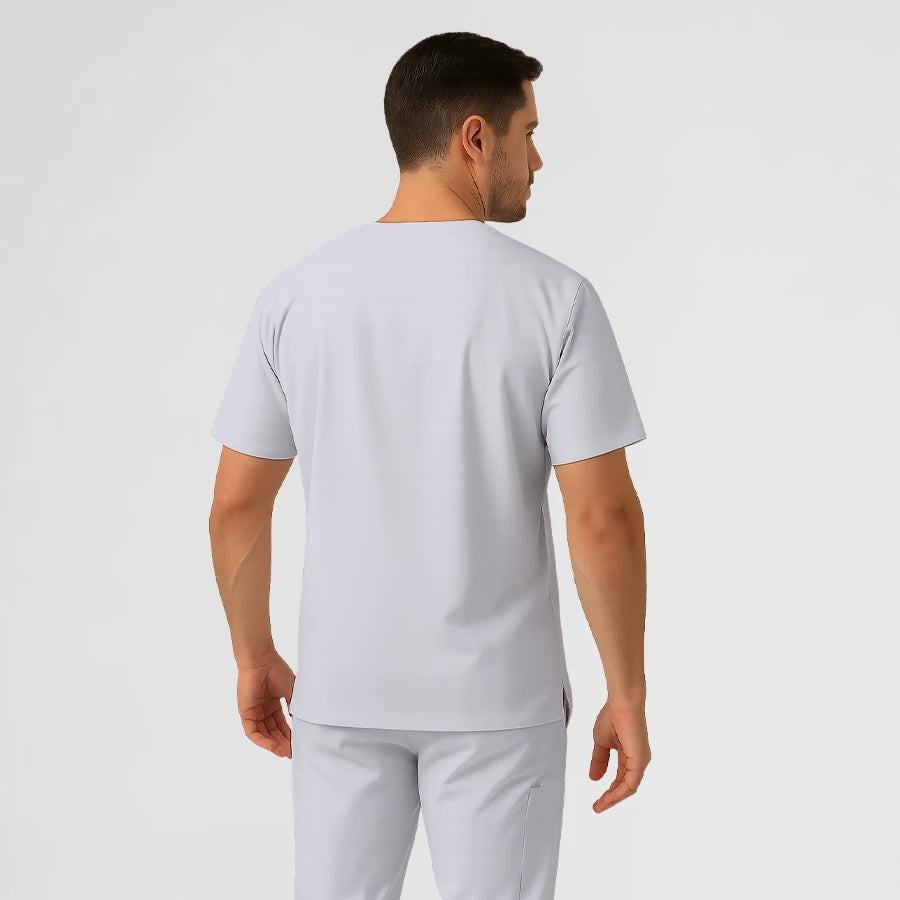 Photo de Pyjama de Bloc Homme - Col V Stretch – confort, broderie et style professionnel. FIGS.ma | Scrubs Maroc.