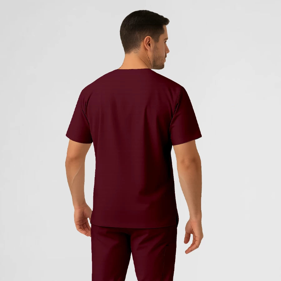 Photo de Pyjama de Bloc Homme - Col V Stretch – confort, broderie et style professionnel. FIGS.ma | Scrubs Maroc.