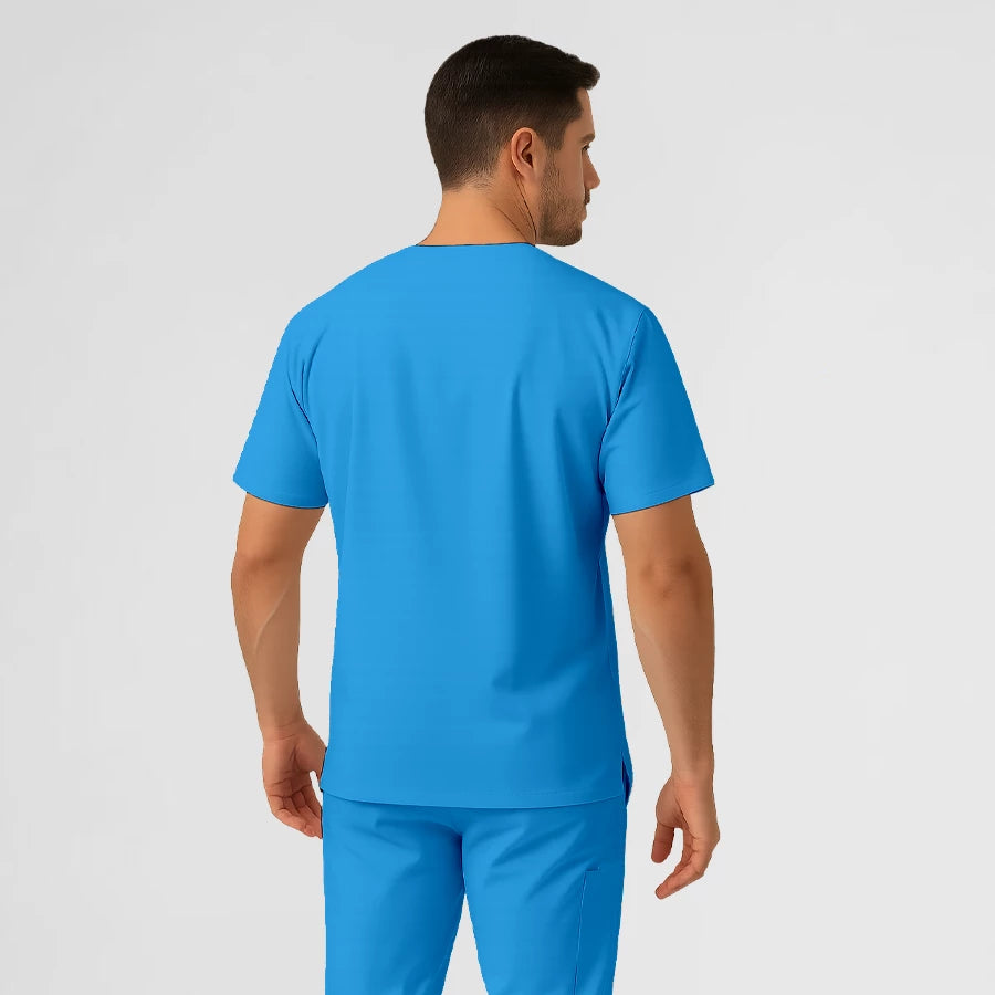 Photo de Pyjama de Bloc Homme - Col V Stretch – confort, broderie et style professionnel. FIGS.ma | Scrubs Maroc.