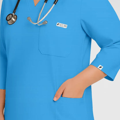Photo de Pyjama de Bloc Femme - Col V Trois Quart Stretch – confort, broderie et style professionnel. FIGS.ma | Scrubs Maroc.