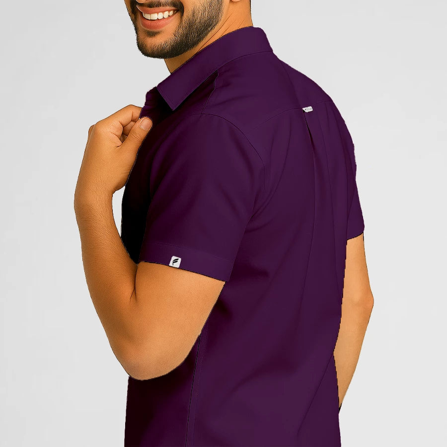 Pyjama de Bloc Homme - Col Chemise Stretch porté par un professionnel de santé | FIGS.ma – Scrubs élégants et performants au Maroc